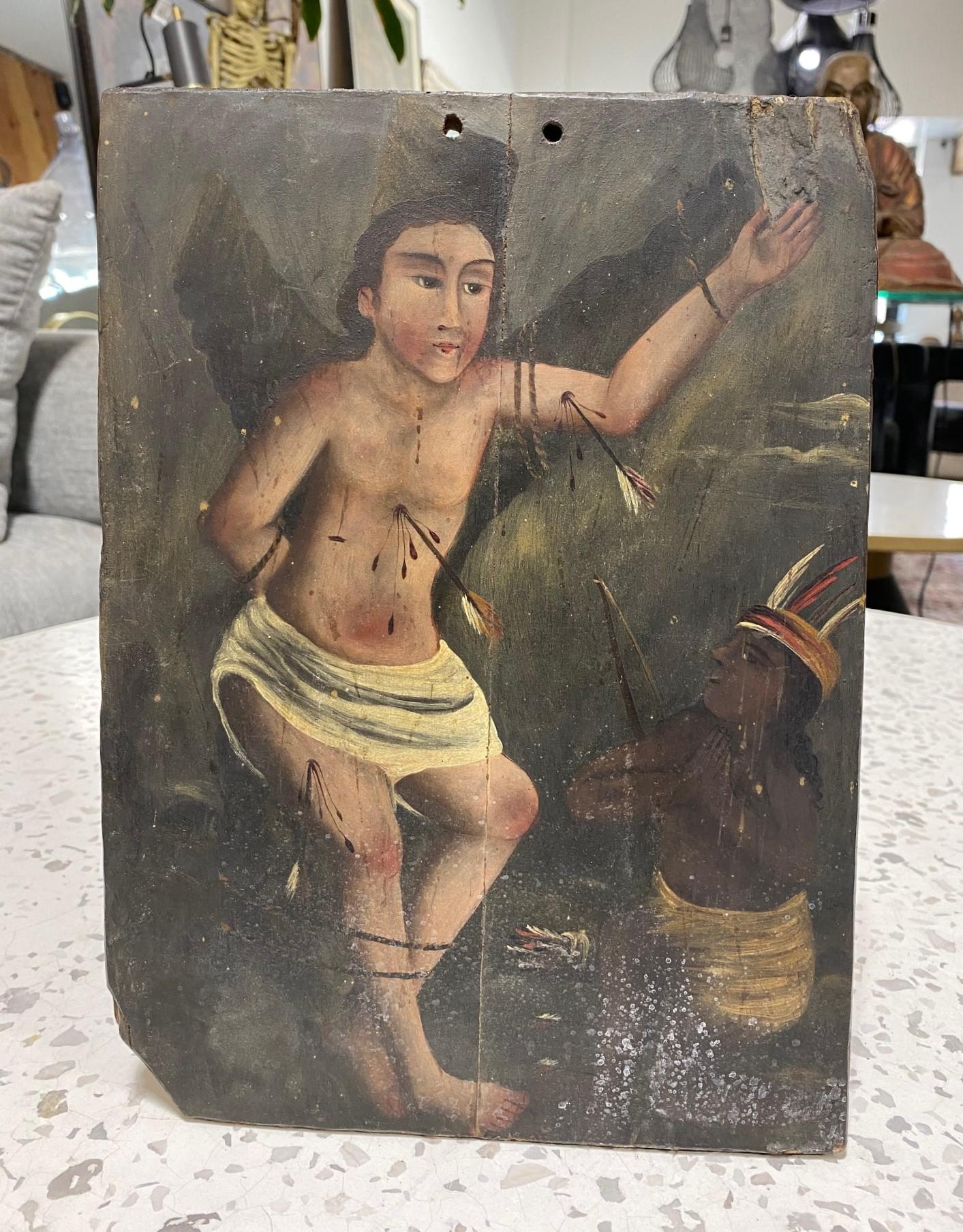 A beautiful 19th-century Spanish Colonial Mexican Folk Art ex-voto retablo lámina painting featuring a crucified Jesus Christ, angel, or saint (possibly Saint Sebastian who was a Roman centurion who converted to Christianity.  As a consequence, the