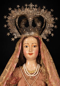 Colonial Peruvian Maguey Wood, unpainted, with silver crown, 18th century