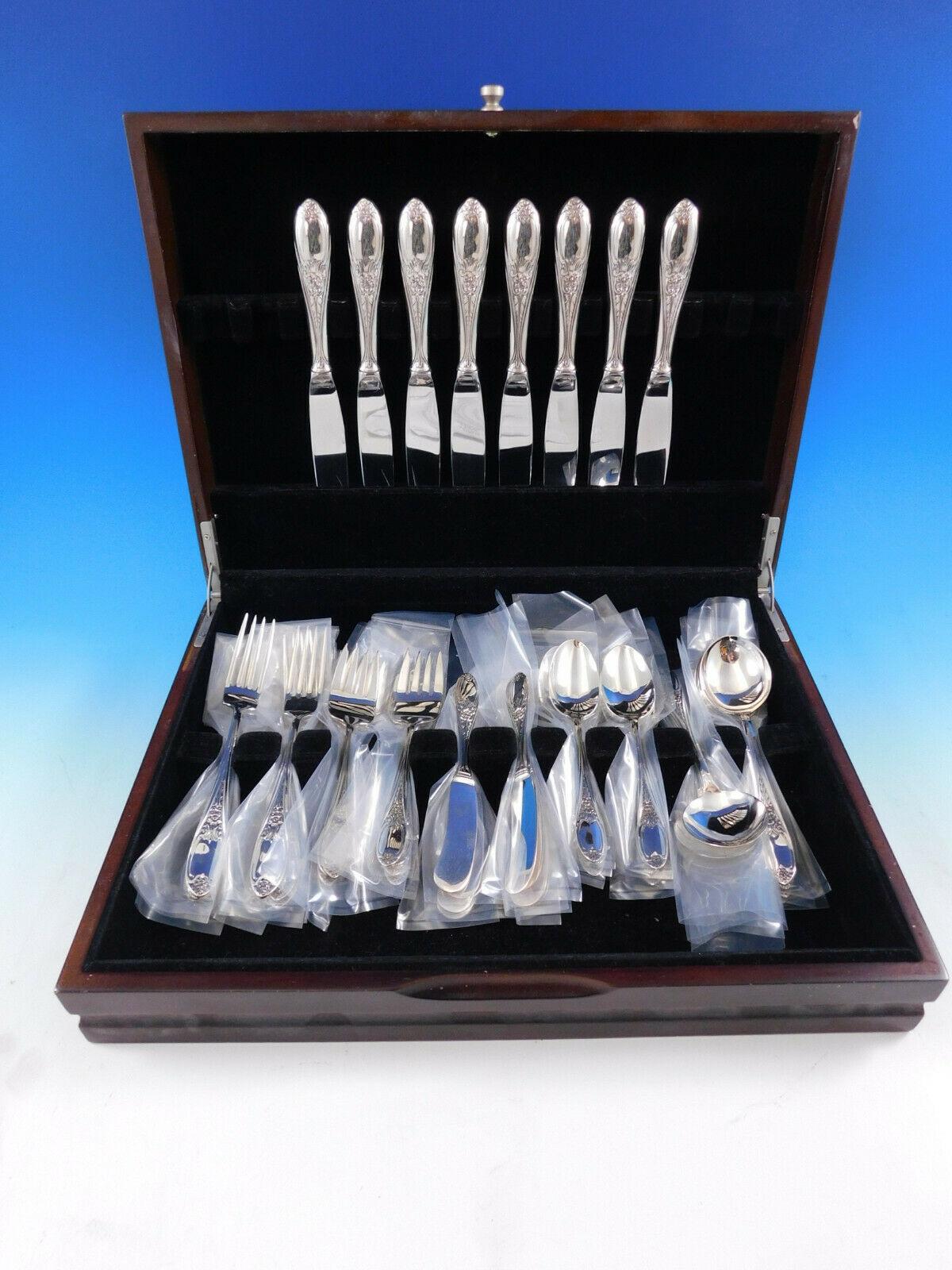 Colonial rose by Amston sterling silver flatware set - 48 pieces. This set includes:

8 knives, 8 3/4
