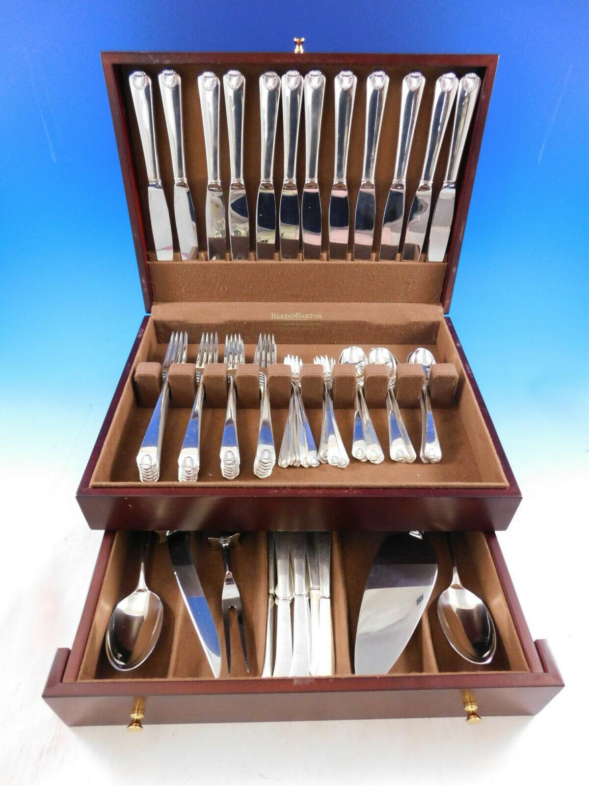 Scarce Dinner Size Colonial Shell by International Sterling Silver Flatware set - 77 pieces. This set includes:

12 dinner size knives, 9 7/8