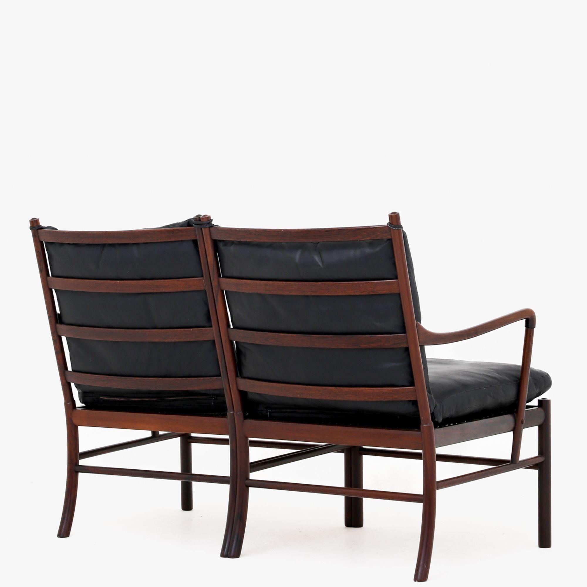 PJ 149/2 - 'Colonial' 2-seater sofa in rosewood with cushions in black patinated leather. Ole Wanscher / P. Jeppesen