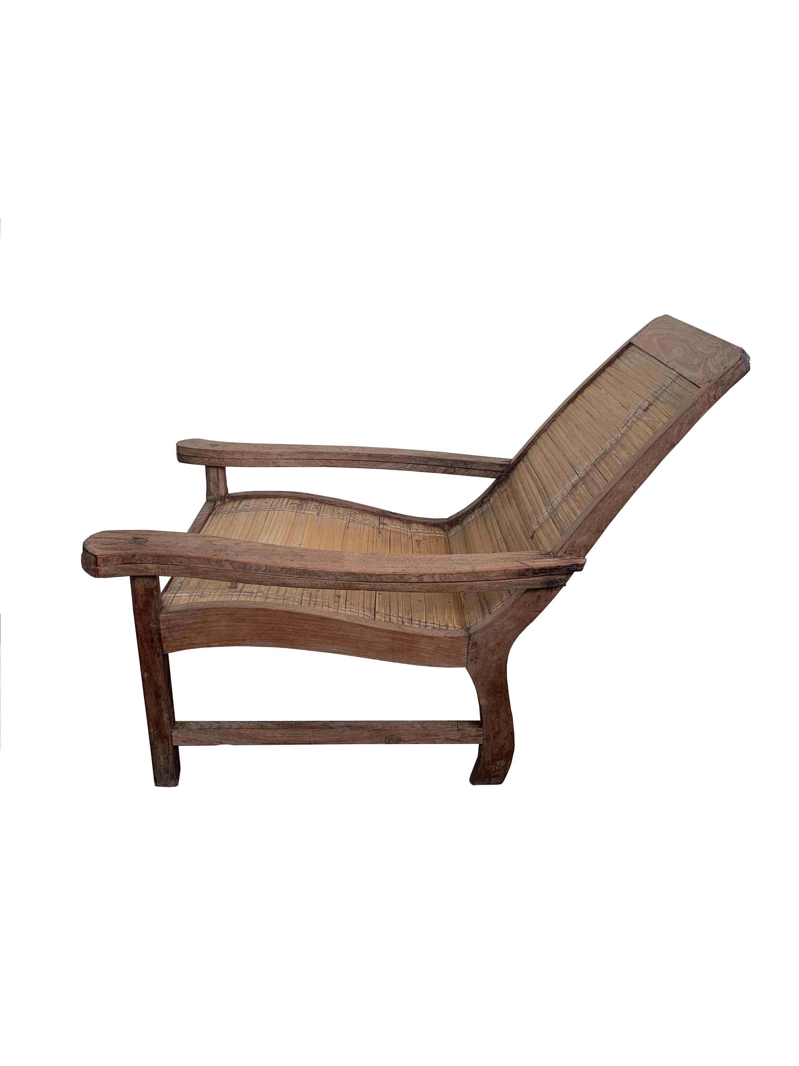 Indonesian Colonial Solid Teak & Bamboo Plantation Chair with Leg Rests, Java, Indonesia