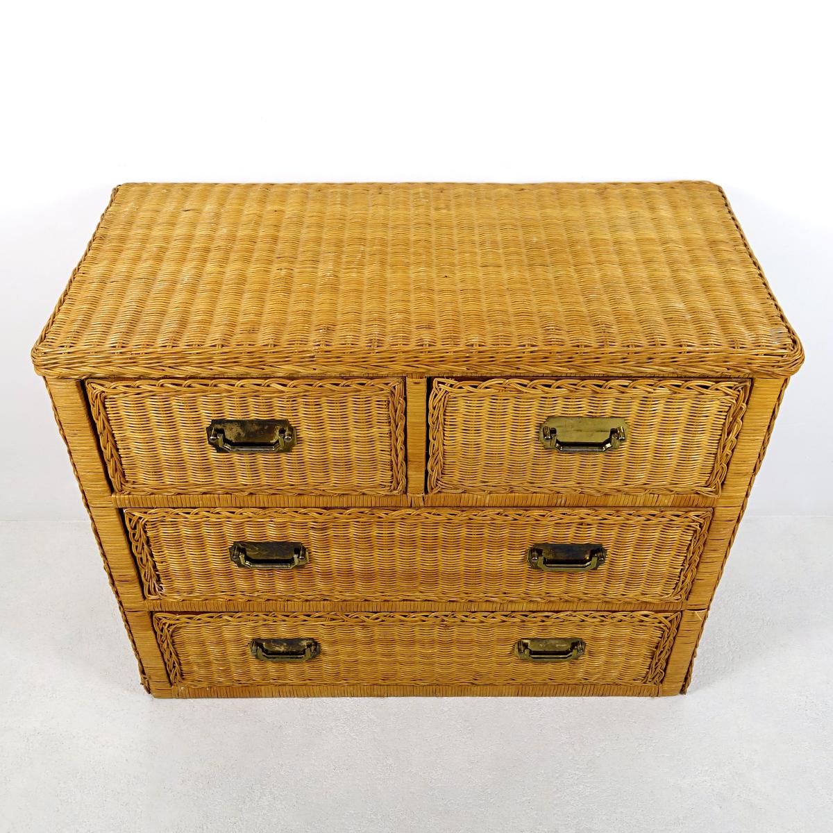 Charming chest of drawers made of rattan in colonial style with four wooden drawers, two smaller ones on the 