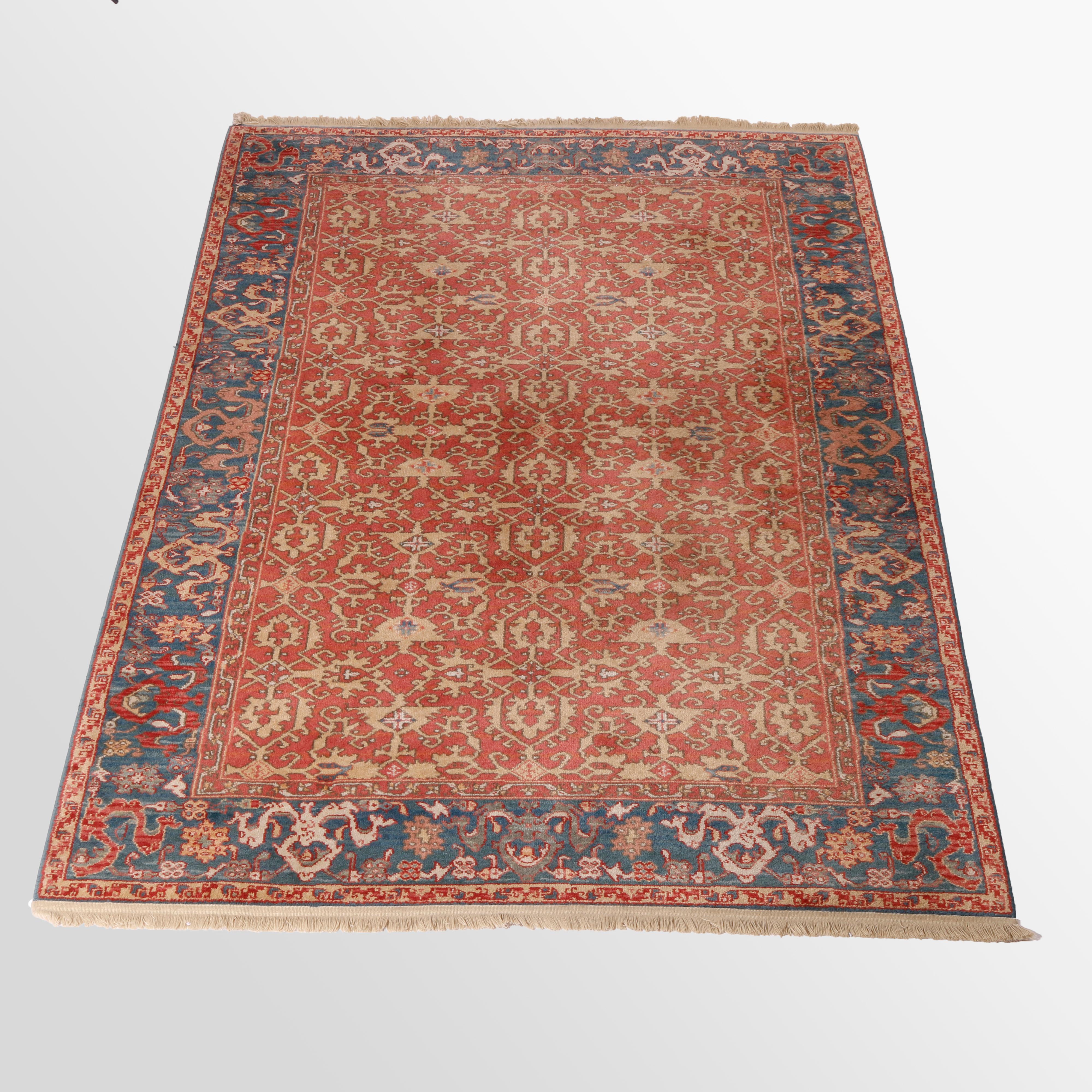 A Colonial Williamsburg Karastan Ushak oriental rug in Pattern 552 offers wool construction with stylized floral and foliate allover design, maker label as photographed, 5.8' X 8.11', 20th century

Measures - 111''L x 68''W x .5''D.