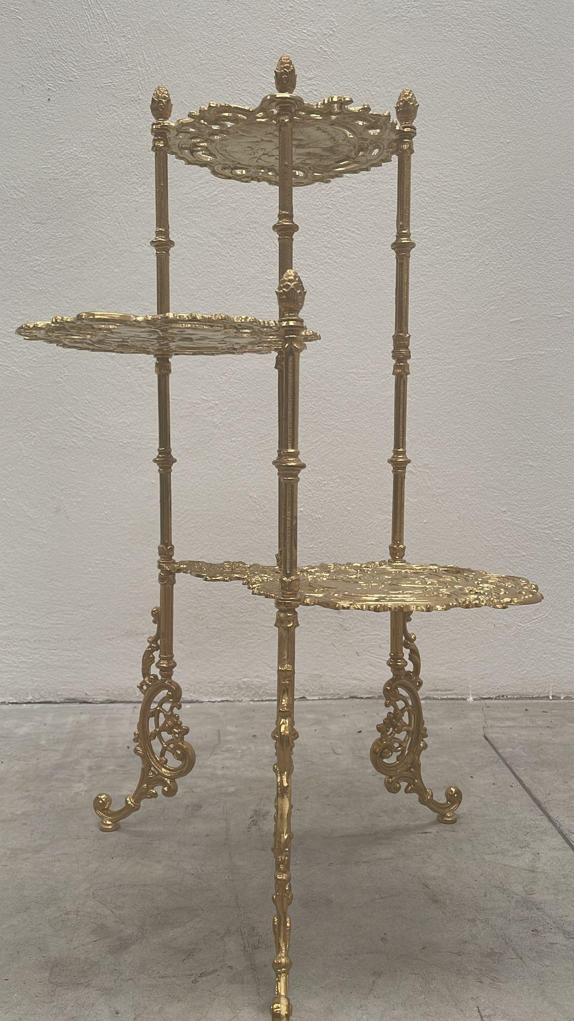 Detailed 3-tier table/column in polished brass. 1970ties. Inspired by Robert Caribbean. Mice Design of Rugiano Domenico 