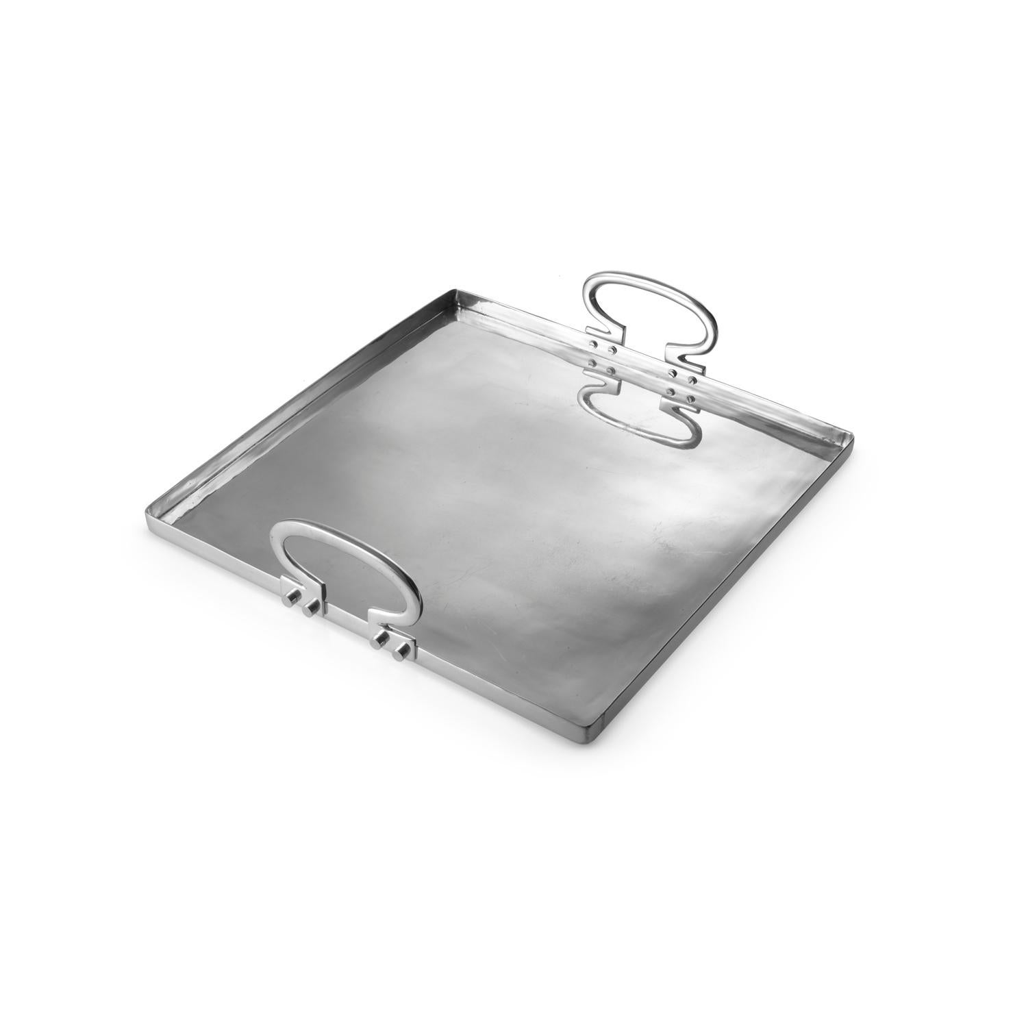 Colony is a polished aluminium tray designed by Aldo Cibic. The square Silhouette is Minimalist, but the rounded corners and the sinuous handles give to the object a warm and refined look. Colony is perfect on any occasion to serve drinks or food