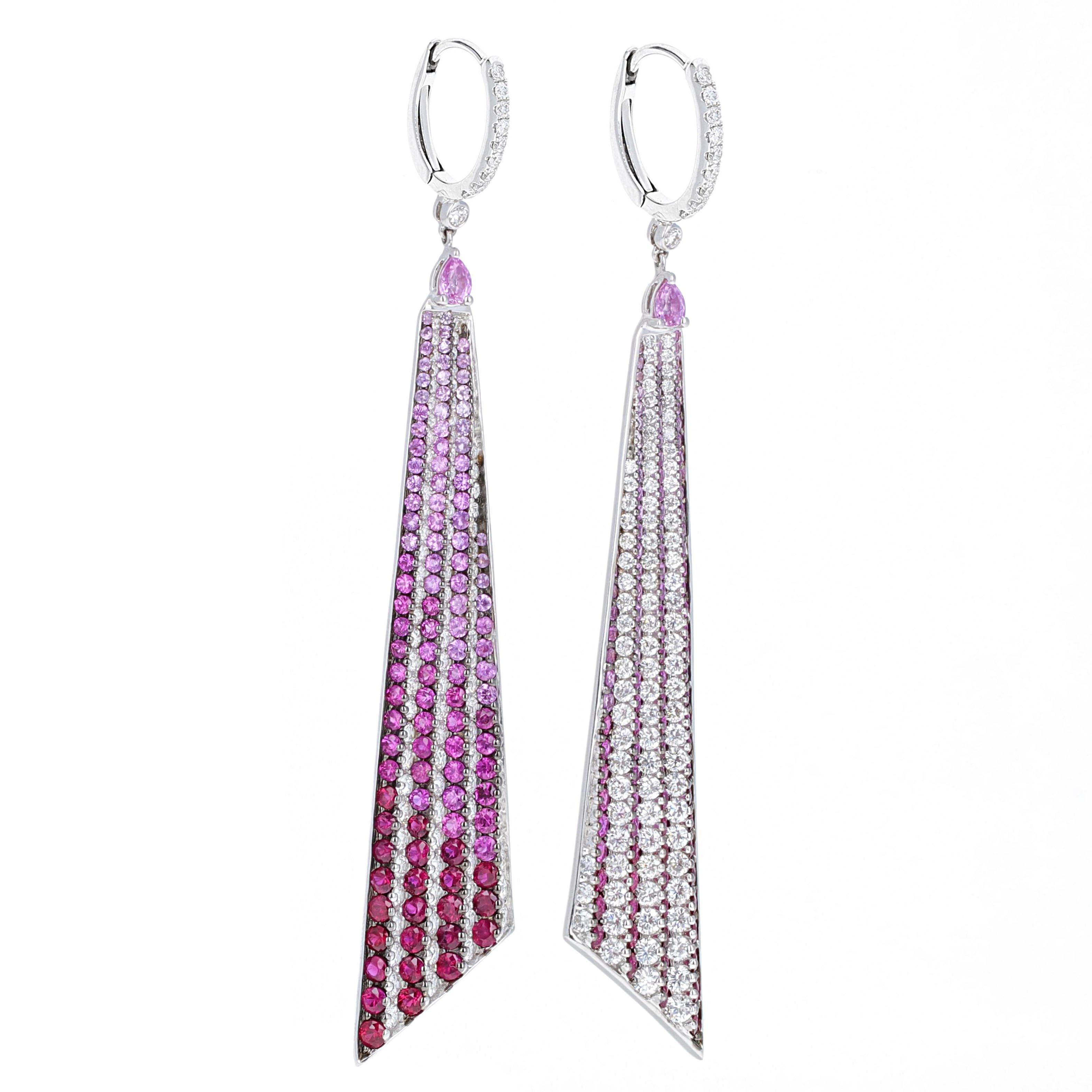 Color changing diamond, ruby and pink sapphire ombre' dangle earrings. They are one of a kind, fashion forward earrings. These earrings are a true show stopper. When you look at the earrings from different angels, the color changes from all white