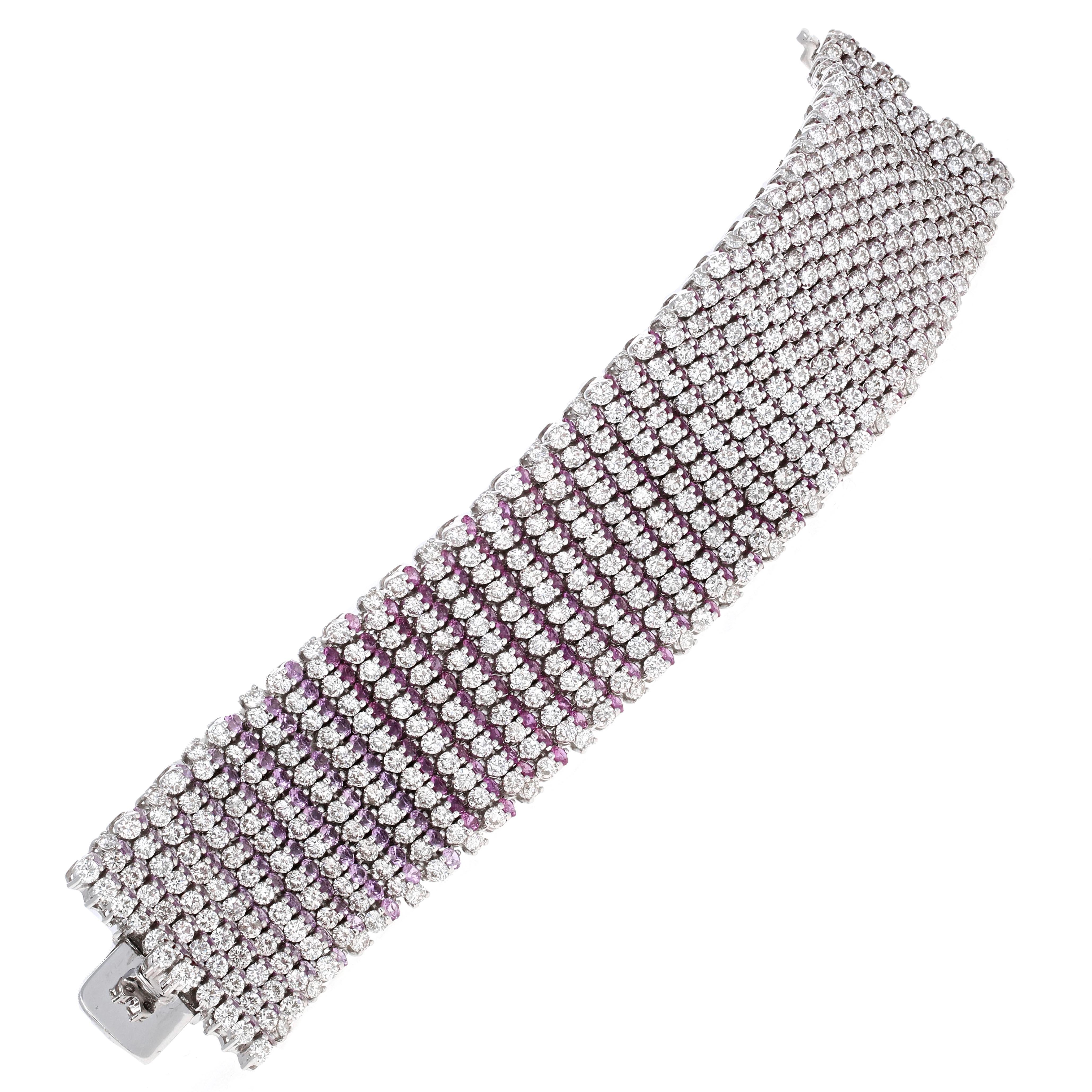 Unique ruby and pink sapphire ombre' mesh bracelet. This bracelet is a true show stopper. When you look at the bracelet from one angel it creates a dazzling ombré effect of light pink sapphires to deep red rubies. When looking at the bracelet from