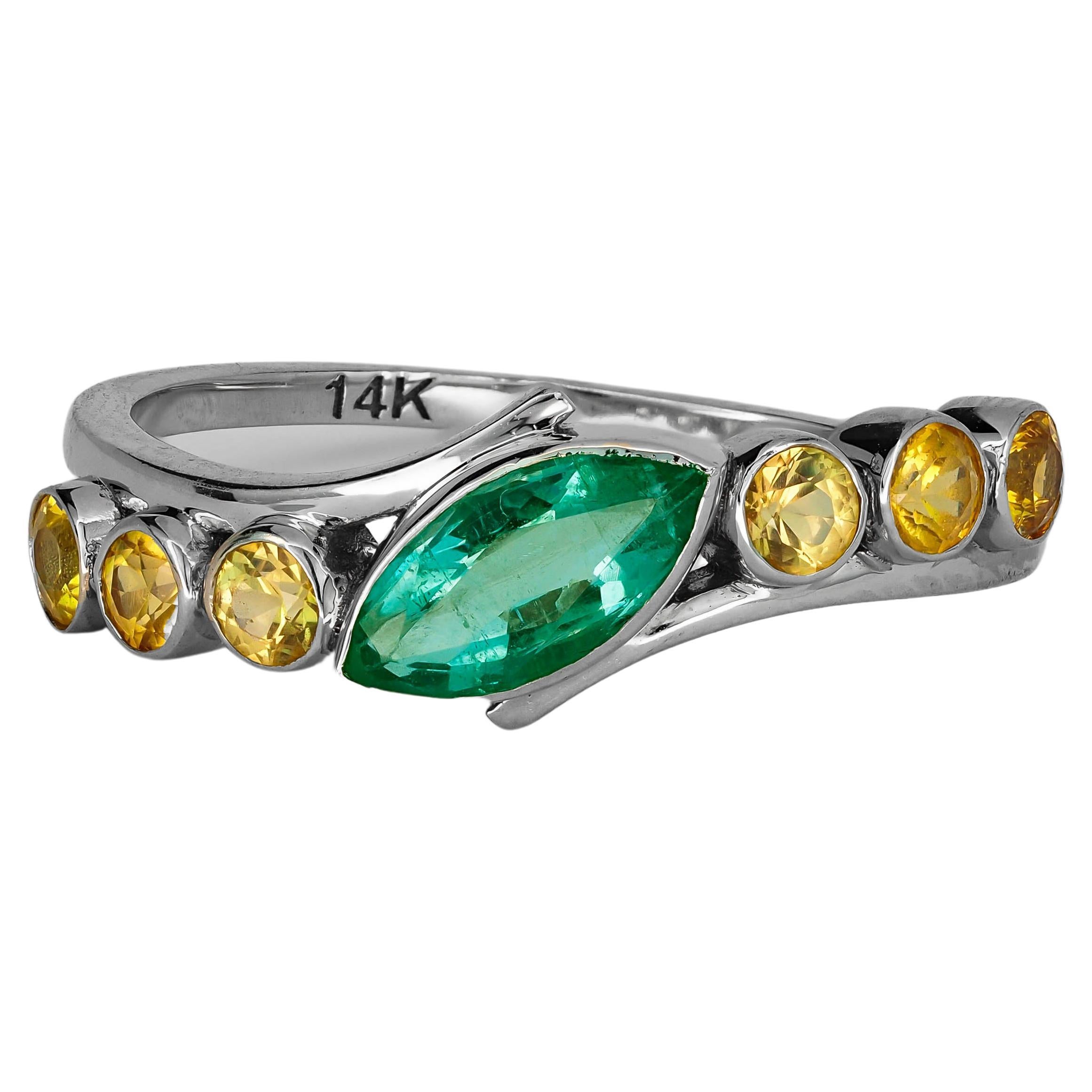 Farbkontrast-Ring aus 14k Gold mit Smaragd im Marquise-Schliff und Saphiren