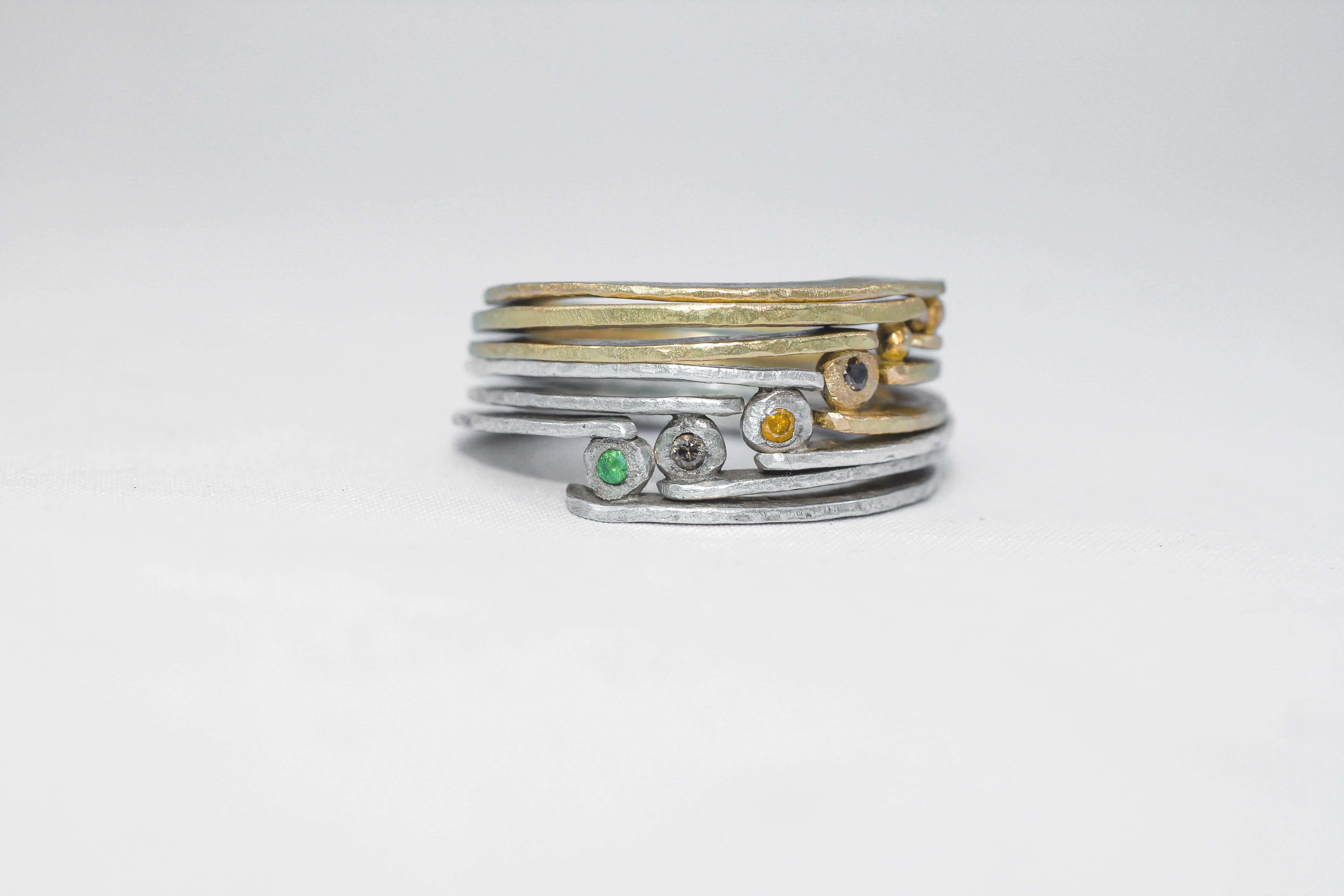 Color diamonds are set in 18K gold and sterling silver rings. Simplicity With A Twist band fashion stack of six rings. Stack #23. This contemporary design by AB Jewelry NYC can be worn as an alternative engagement or wedding band. This fashion band