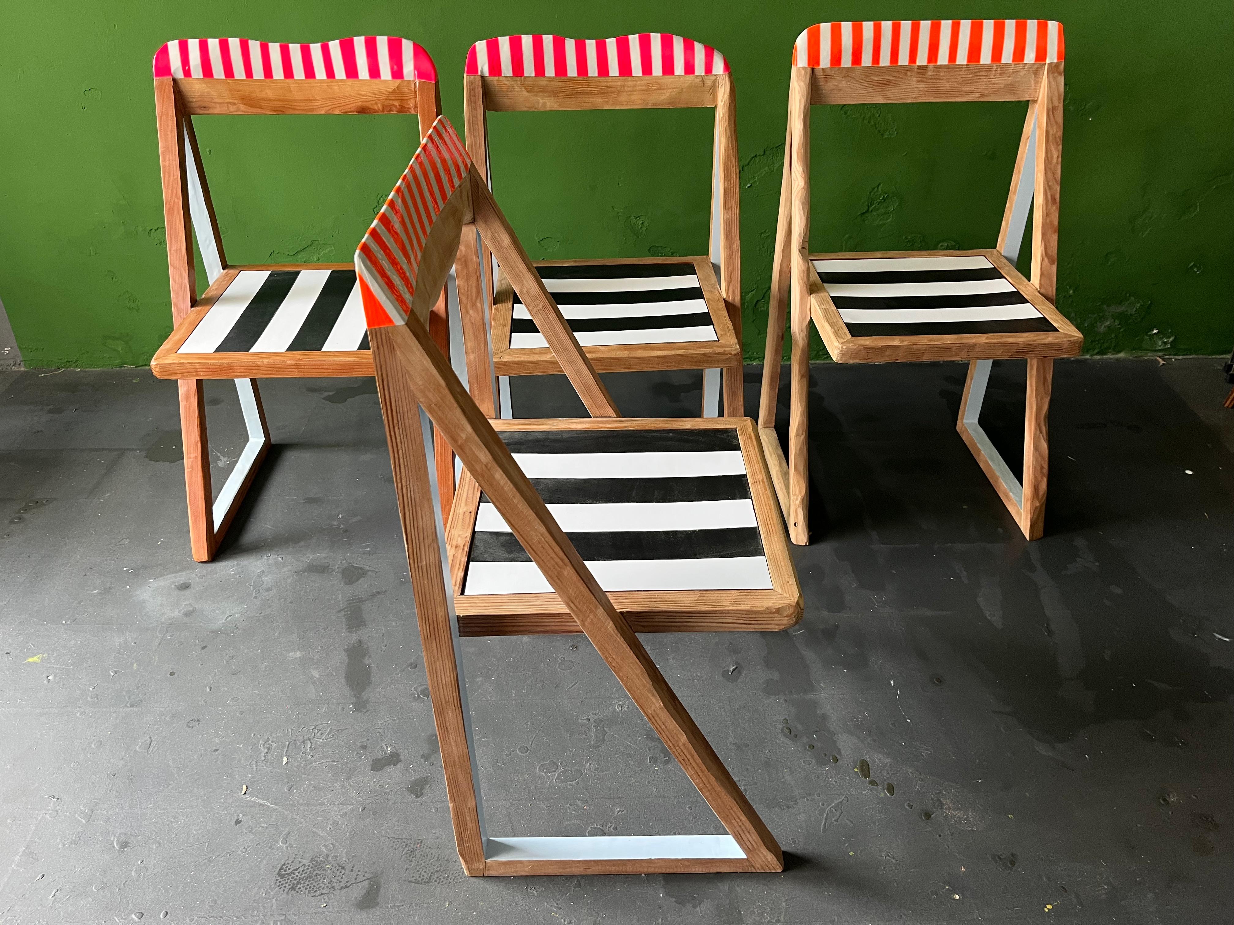These 80's triangle chairs where re-shaped, colored in neon and white, multilacquered, black and white leather strips on the seat. A perfect example of Staabs funktional art pieces. 
Through my work I transform each chair into a unique and