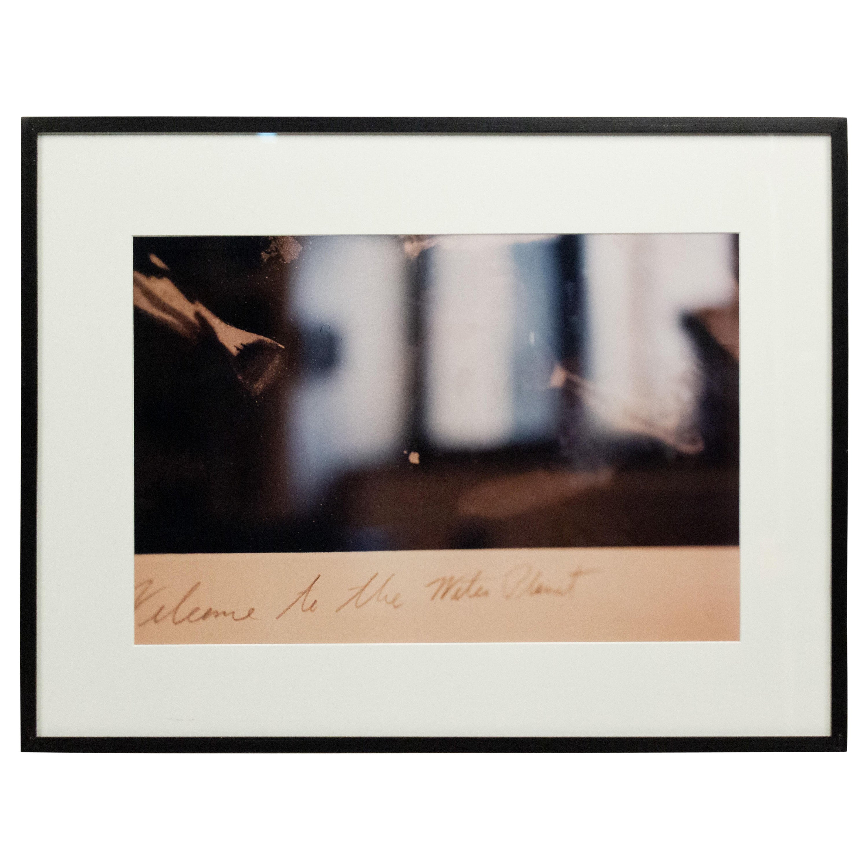 Photographie couleur d'une photographie avec script