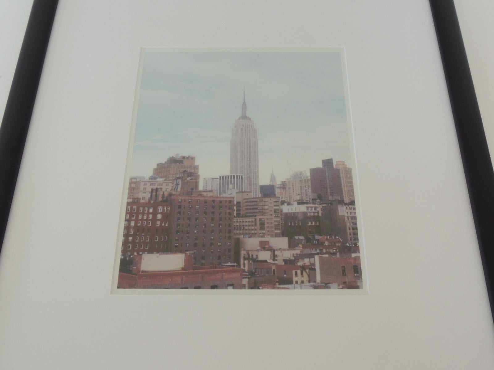 Color photograph of Empire State Building New York City.
