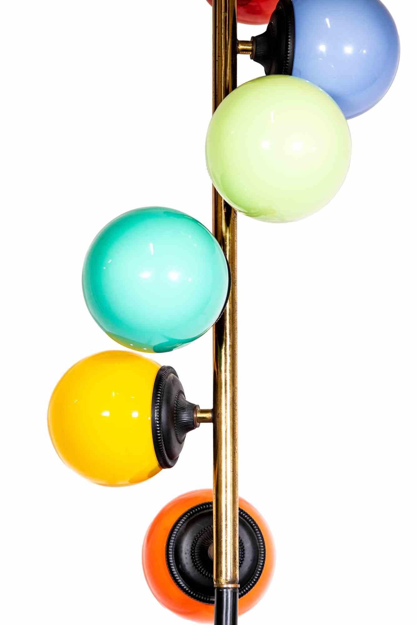 Colored bubble lamp is an original design lamp attributed to Stilnovo, and realized in the 1960s.

A super design lamp composed by six colored Murano glass lights.

Steel and brass stem. Marble base.
  