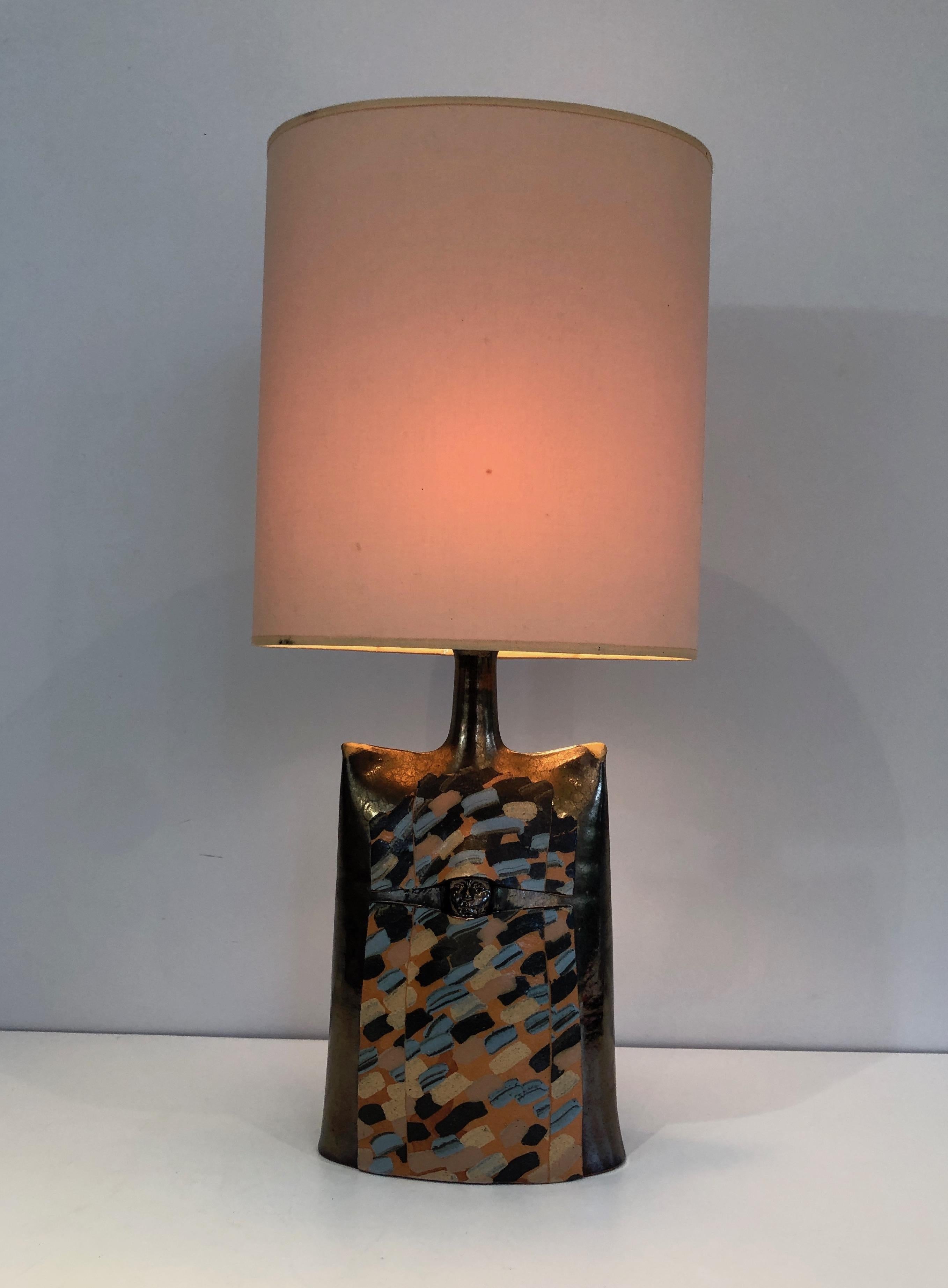 Mid-Century Modern Colored Ceramic Table Lamp with a Face in Relief, This is a French Work, Circa 1