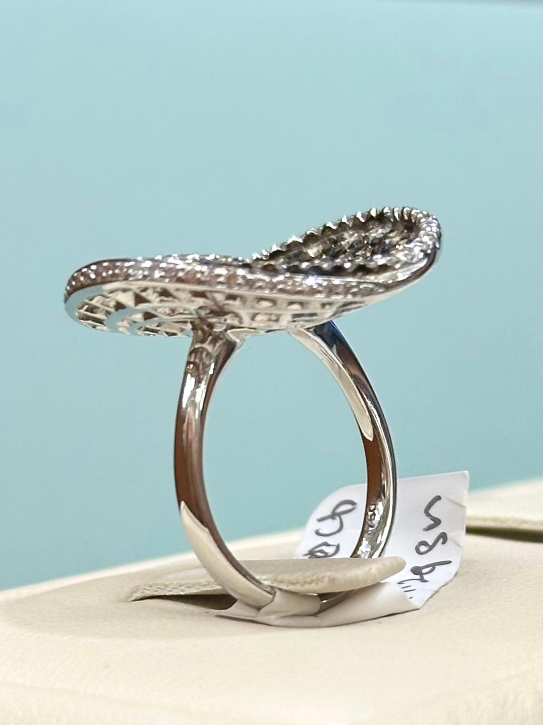 Round Cut Colored Diamond and White Diamond Spiral Ring set in 18k White Gold For Sale