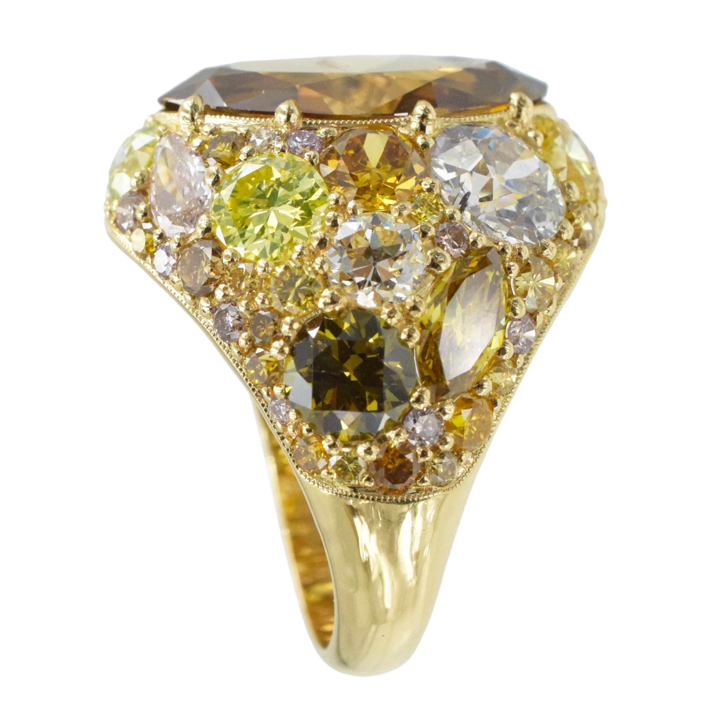 Colored Diamond and Yellow Gold Ring

This bombe style ring has 55 yellow round diamonds weighing a total of 1.35 carats, 18 various shape and color diamonds weighing 5.62ct (included 6 GIA certified, all natural colors), and a center diamond of