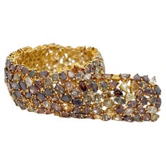 Grand bracelet tennis en diamants de couleur
