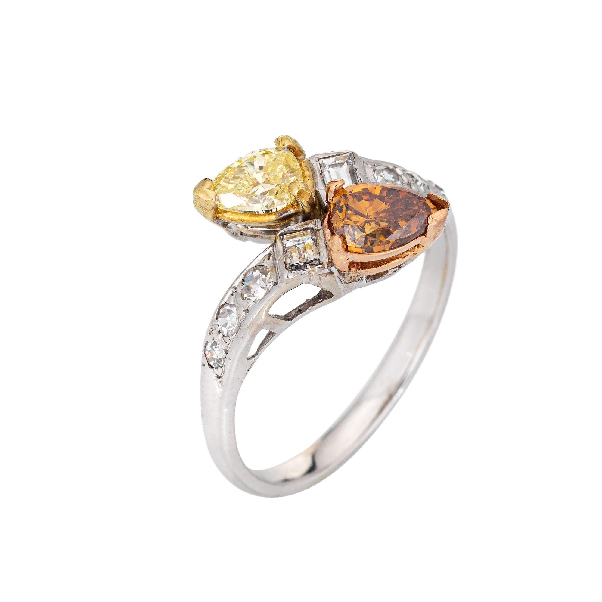 Stylish vintage colored diamond 'moi et toi' ring crafted in 14k white gold. 

One pear cut yellow diamond is estimated at 0.38 carats (estimated at SI2 clarity) and one pear cut brown/orange diamond estimated at 0.60 carats (estimated at SI2