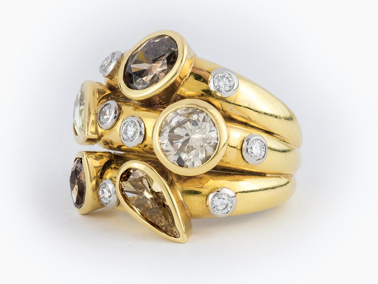 18k gold triple stack ring, set with white, champagne and fancy brown diamonds. Signed DAVID WEBB 900PT. Similar ring in last Webb book. Size 6