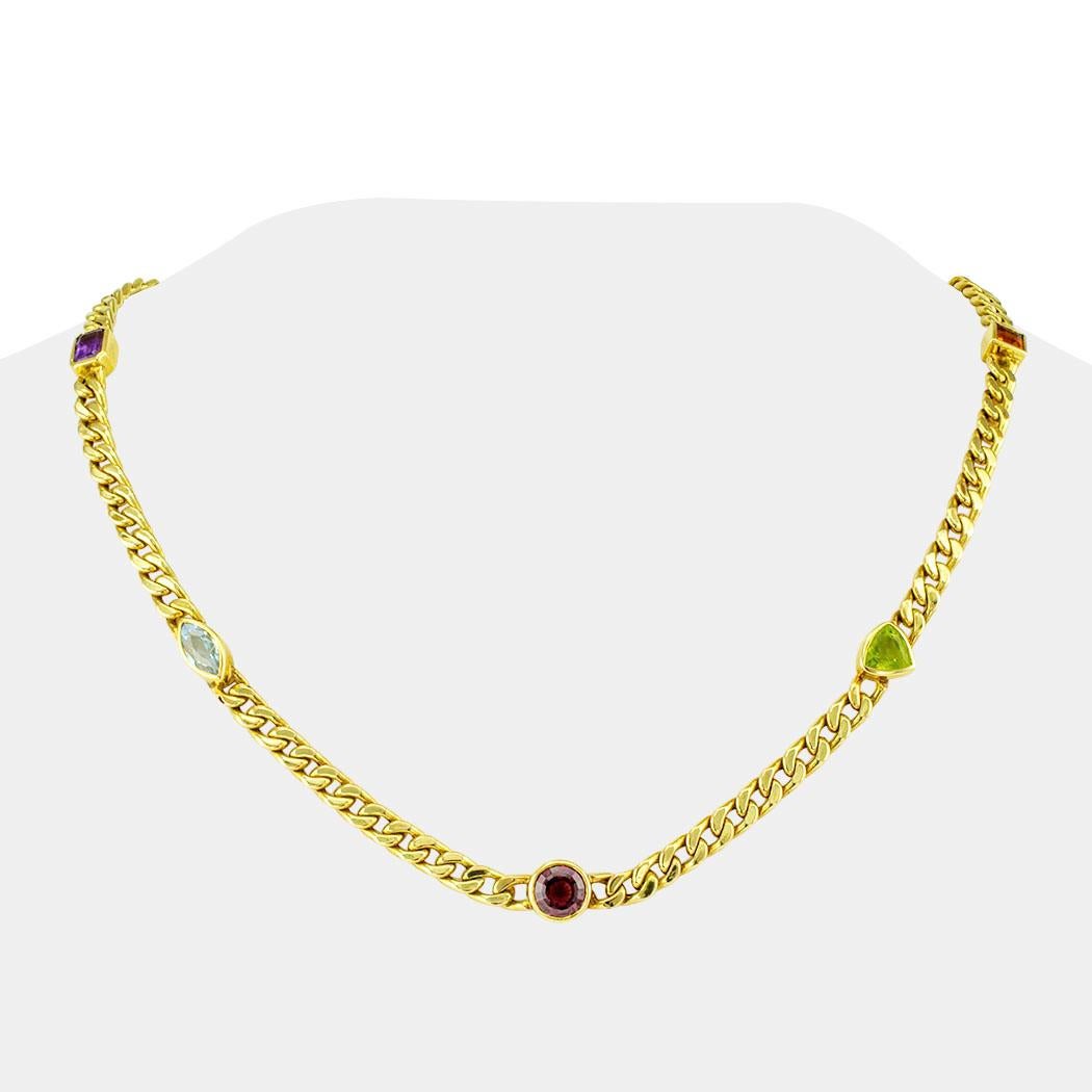 Estate 1980s gemstone and gold link necklace. Decorated to the fore, at equal intervals, with five bezel-set color gemstones of various shapes and sizes, including: aquamarine, amethyst, citrine, peridot and tourmaline, mounted in 14-karat yellow