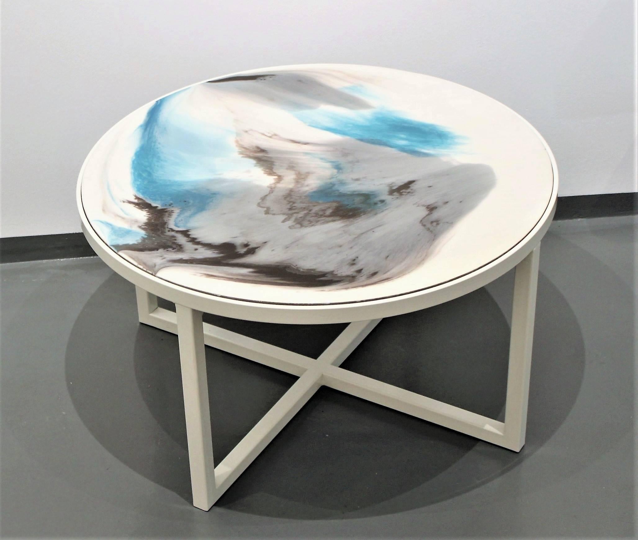 Unique handmade coffee table and part of Viscosity Art & Resin Gallery collection. The tabletop is made of hand-painted layers of colored resin on wood. A perfect color-contrasting combination of teal and dark brown tones, floating on off-white