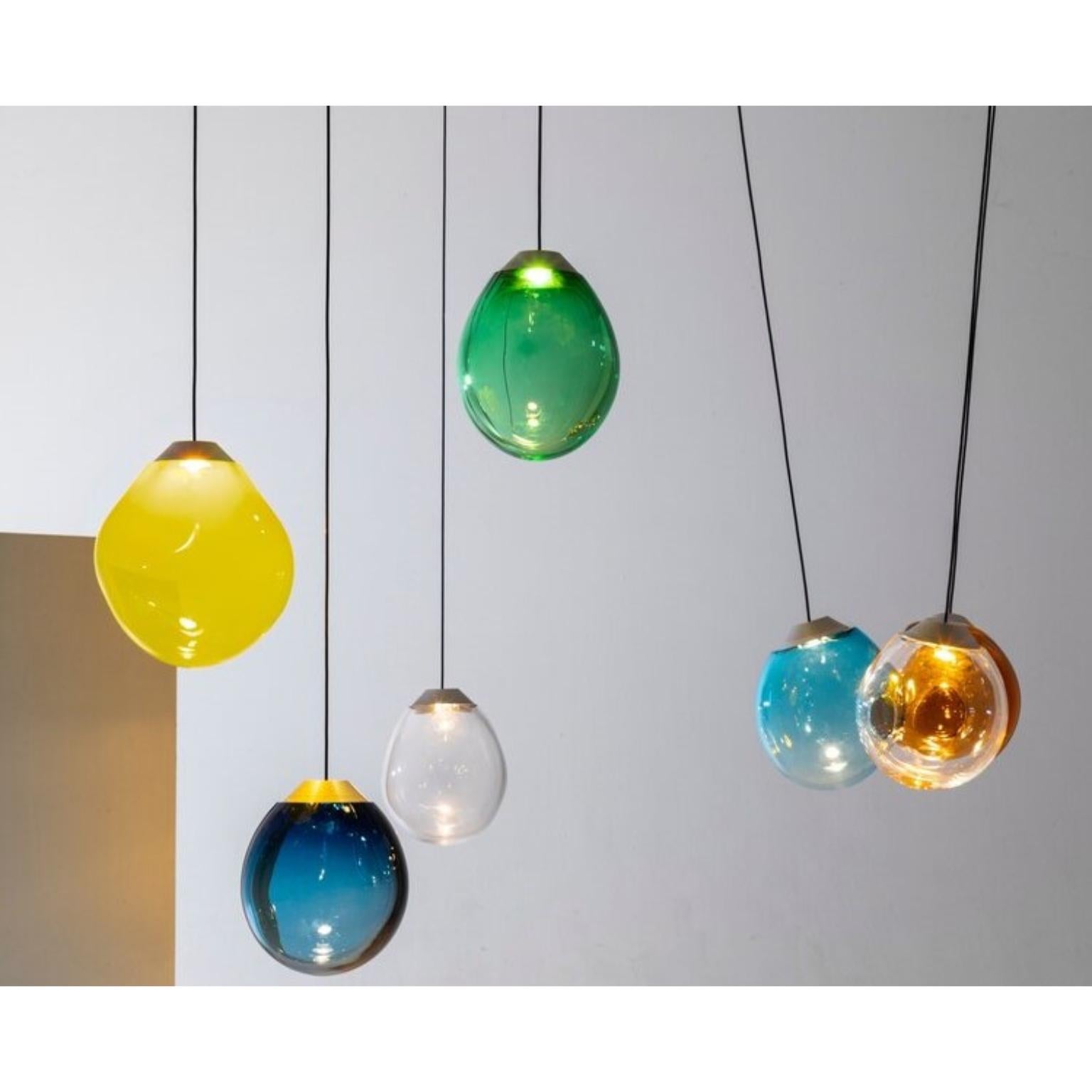 Colored single momentum blown glass pendants by Alex de Witte
Dimensions: 20 -25 cm
Materials: Mouth Blown Glass

With the Momentum Alex de Witte has found the prefect artistic defining moment while playing with the boundaries of glass blowing
