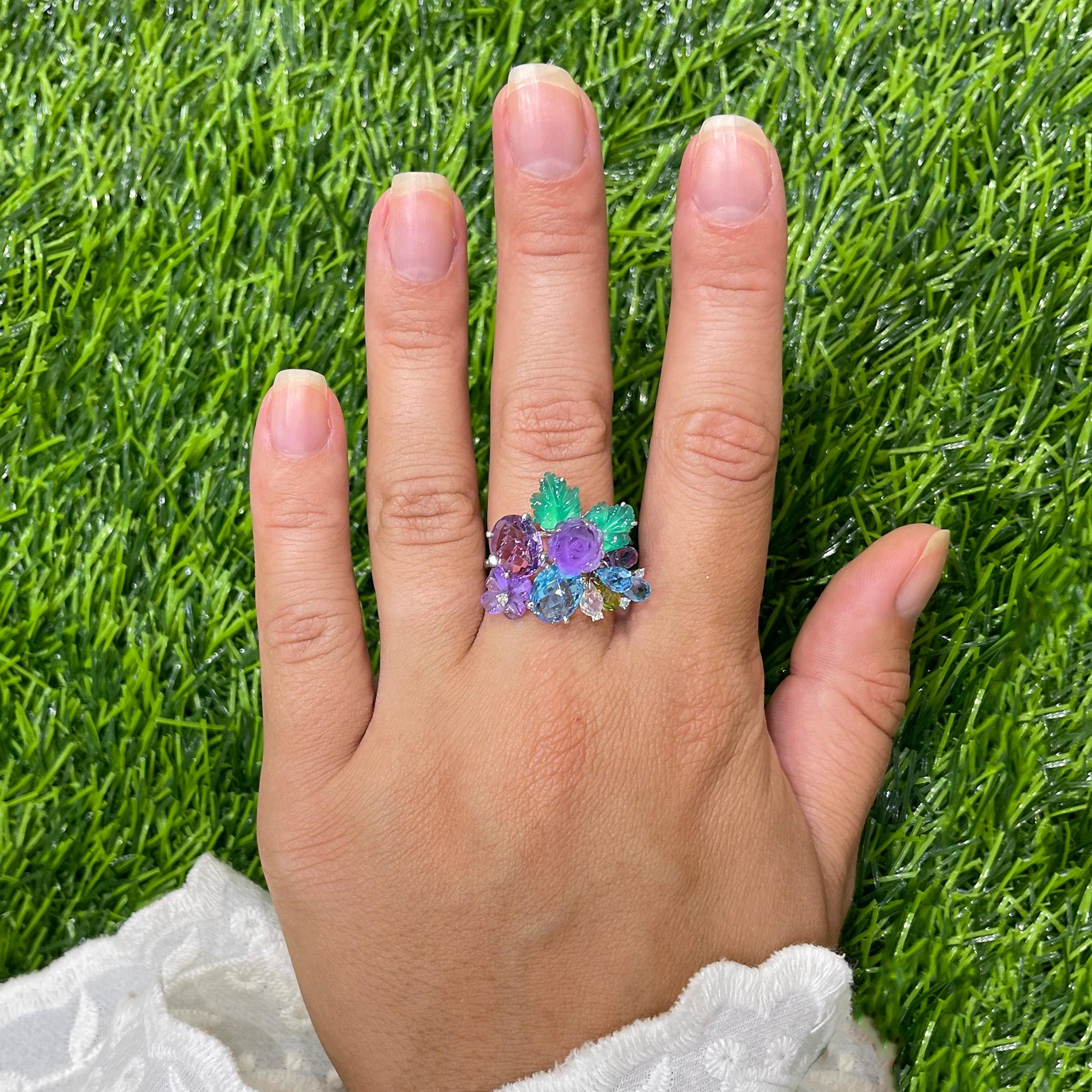 Beautiful Flower Cocktail Ring Set With Colored Stones (Topaz, Amethyst, Diamonds, etc)
The ring has moving part. It give a ring extra sparkle while wearing. It comes with an appraisal by GIA G.G.
Total Carat Weight of all Gemstones is 4.95