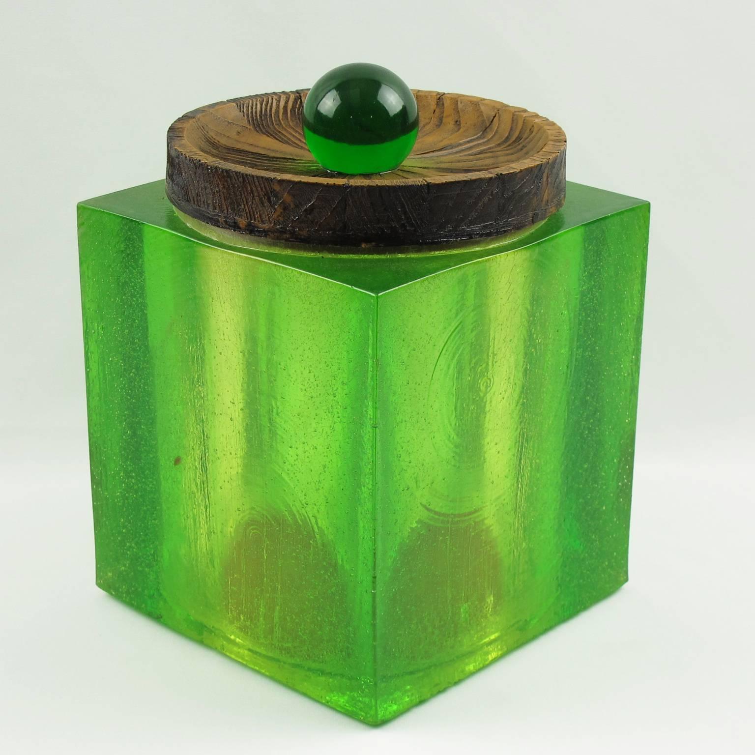 Stunning Mid-Century Modern barware accessory by Colorflo Decorator Products. Tall cubical shape body with incredible resin in key lime green color. The material really captures the light and totally glows, a cool statement piece. Design with