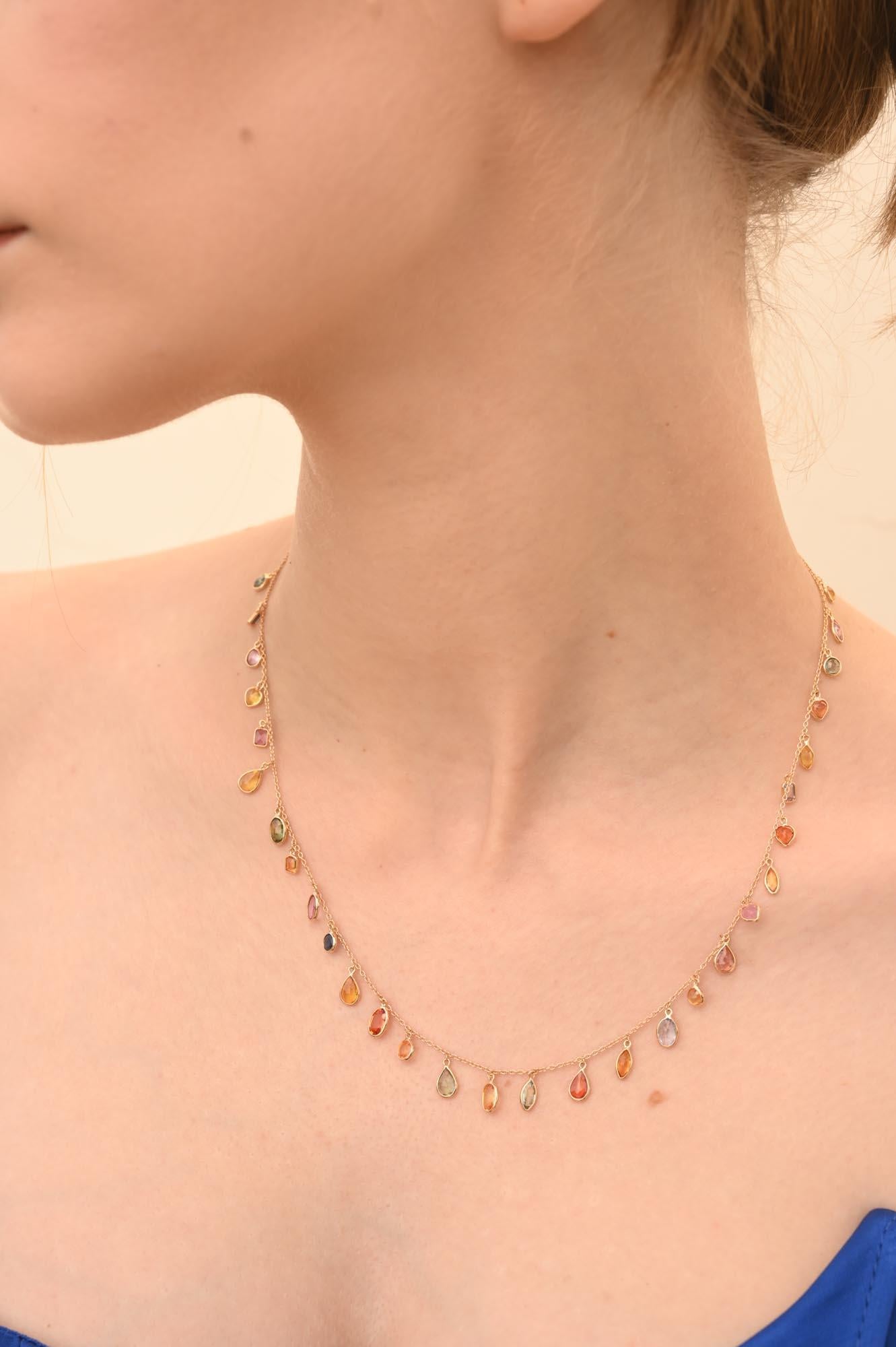 Colorful Multi Sapphire Chain Necklace studded with sapphire in 18K Gold. This stunning piece of jewelry instantly elevates a casual look or dressy outfit. 
Emerald enhances the intellectual capacity. 
Designed with uneven cut sapphires set in bezel