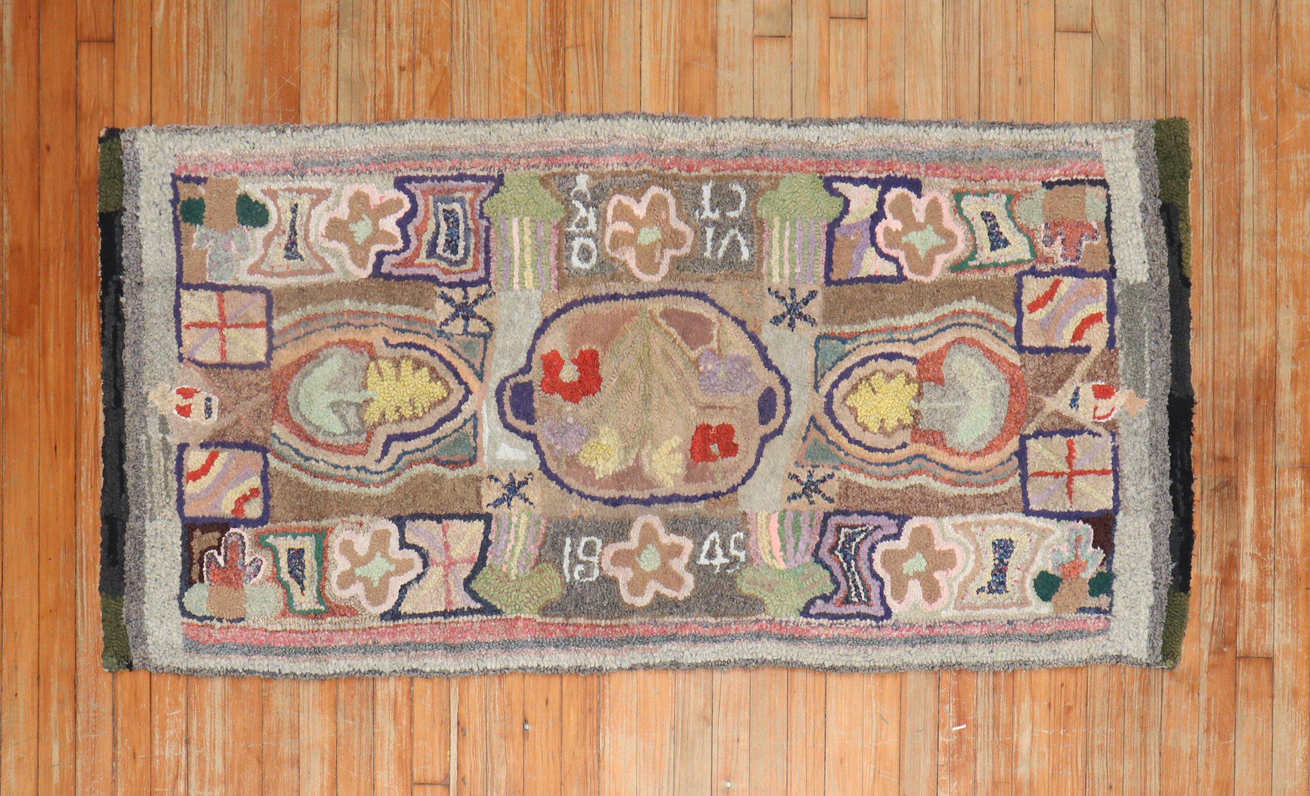 A 20th-century American hooked colorful rug. Dated 1949

Measures: 2'7'' x 5'6''.