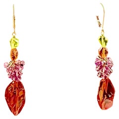 Colorful and unique long amber drop earrings of amber , amethyst, and peridot