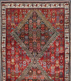 Antique Caucasian Karabagh Runner with Bold Diamond Medallion on Rich Red Field