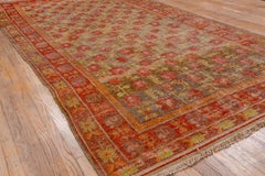 Colorful Antique Khotan Gallery Rug with Tones of Light Purple, Red and Mustard