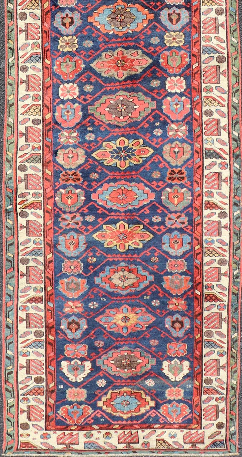 Colorful Antique N.W. Persian Runner with Sub-Geometric All-Over Floral Motifs  In Good Condition For Sale In Atlanta, GA