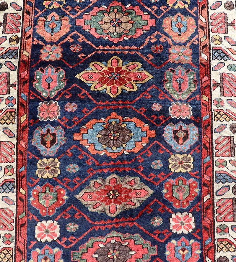 Colorful Antique N.W. Persian Runner with Sub-Geometric All-Over Floral Motifs  For Sale 1