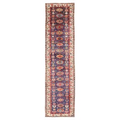 Antique N.W. coloré Tapis de course persan à motifs floraux subgéométriques sur tout le pourtour