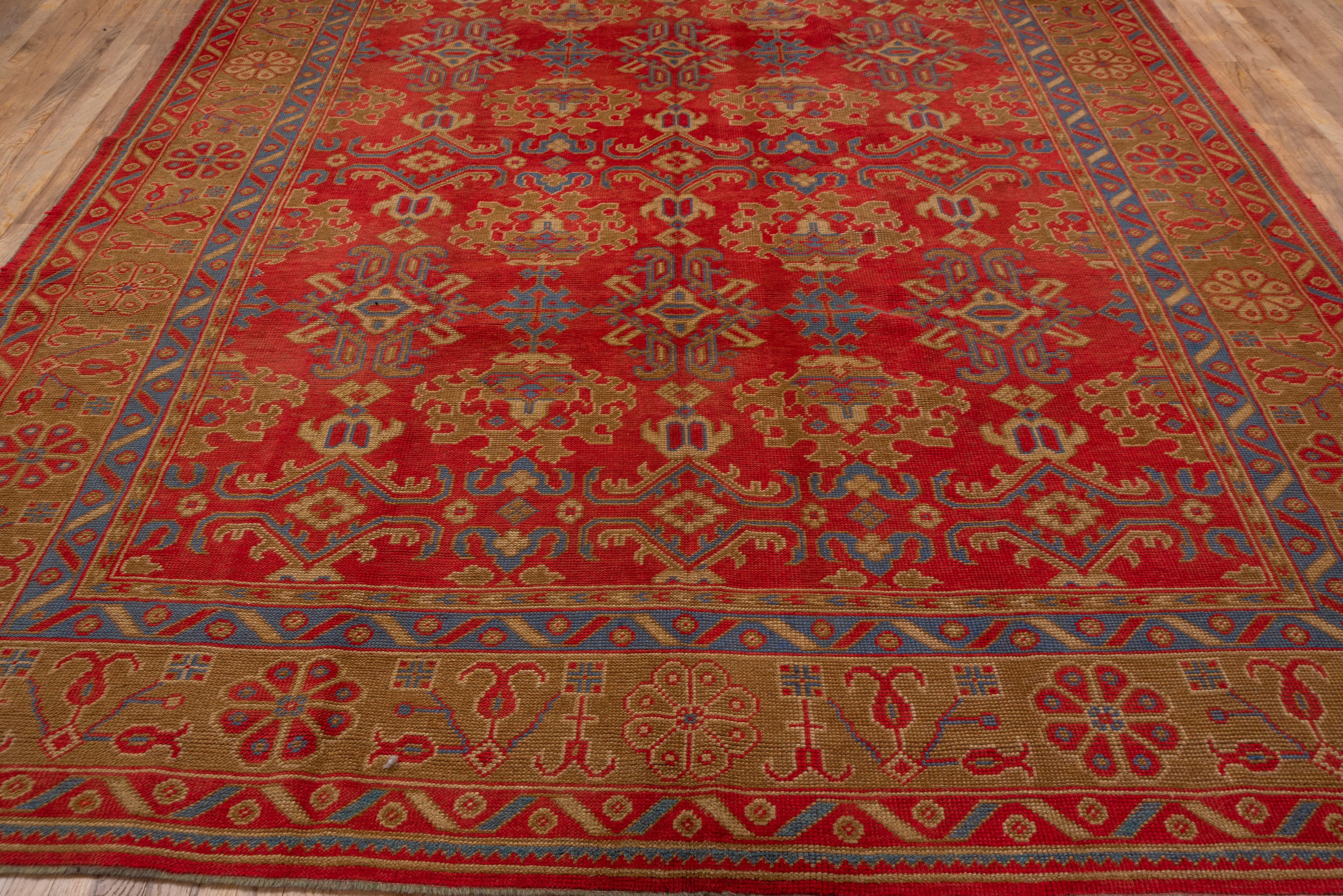 Hand-Knotted Colorful Antique Oushak Rug, Bright Red Field, Multicolored Borders, circa 1930s For Sale