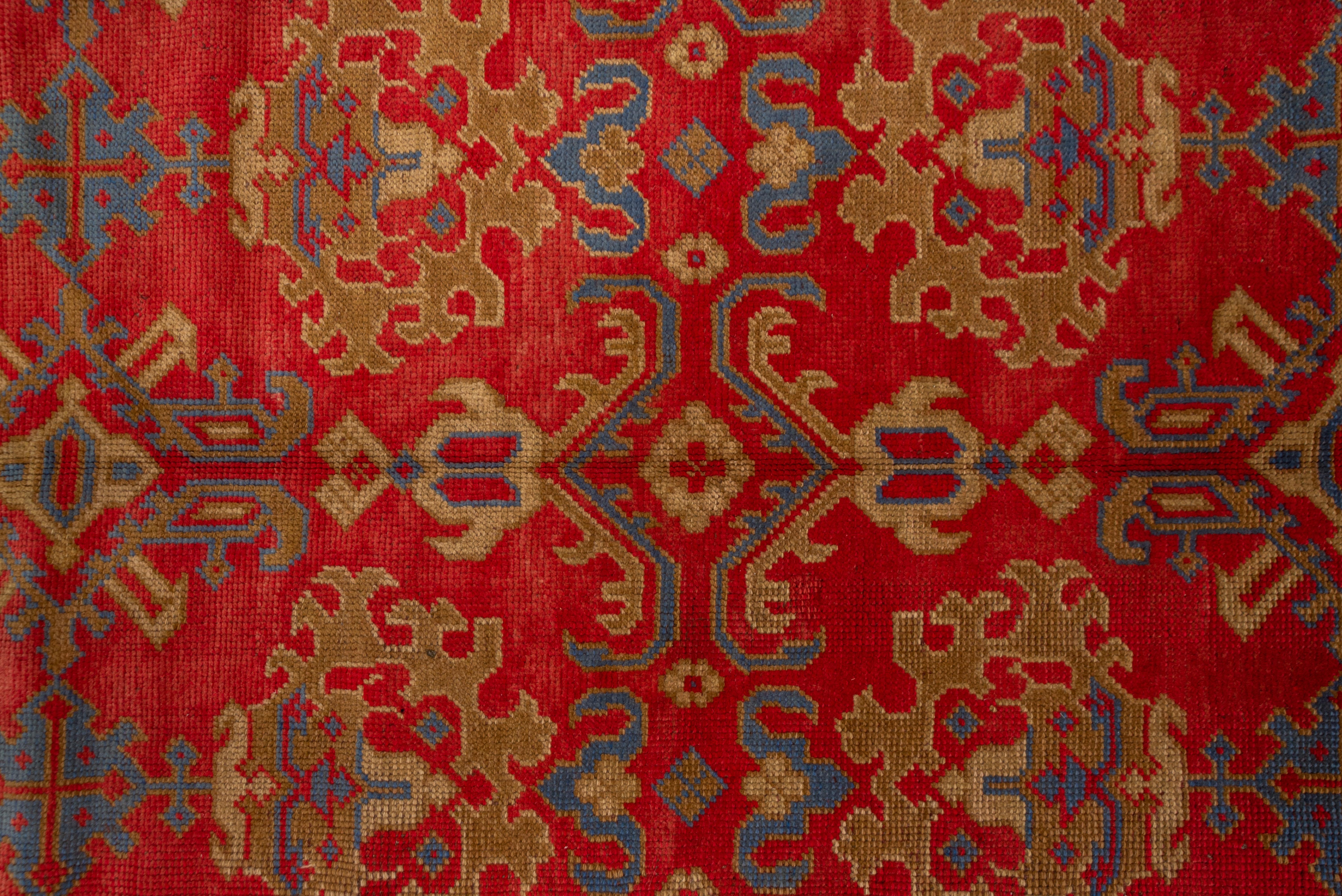 Colorful Antique Oushak Rug, Bright Red Field, Multicolored Borders, circa 1930s In Good Condition For Sale In New York, NY