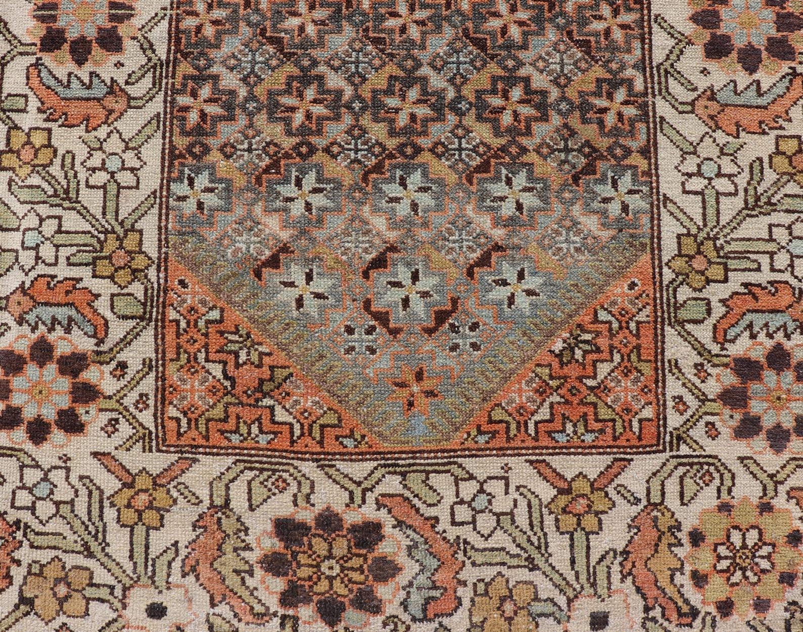 Antique hand knotted Bakhtiari Runner from Persia with multicolored all-over floral and geometric design, Keivan Woven Arts / rug EMB-9545-P13074, country of origin / type: Iran / Bakhtiari, circa 1910

Measures: 3'4 x 12'10.