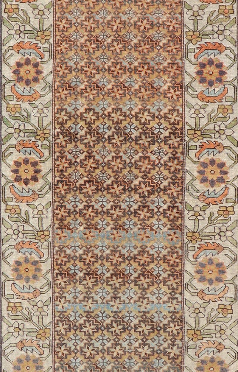 20th Century Colorful Antique Persian Bakhtiari Runner with All-Over Floral and Tribal Border For Sale