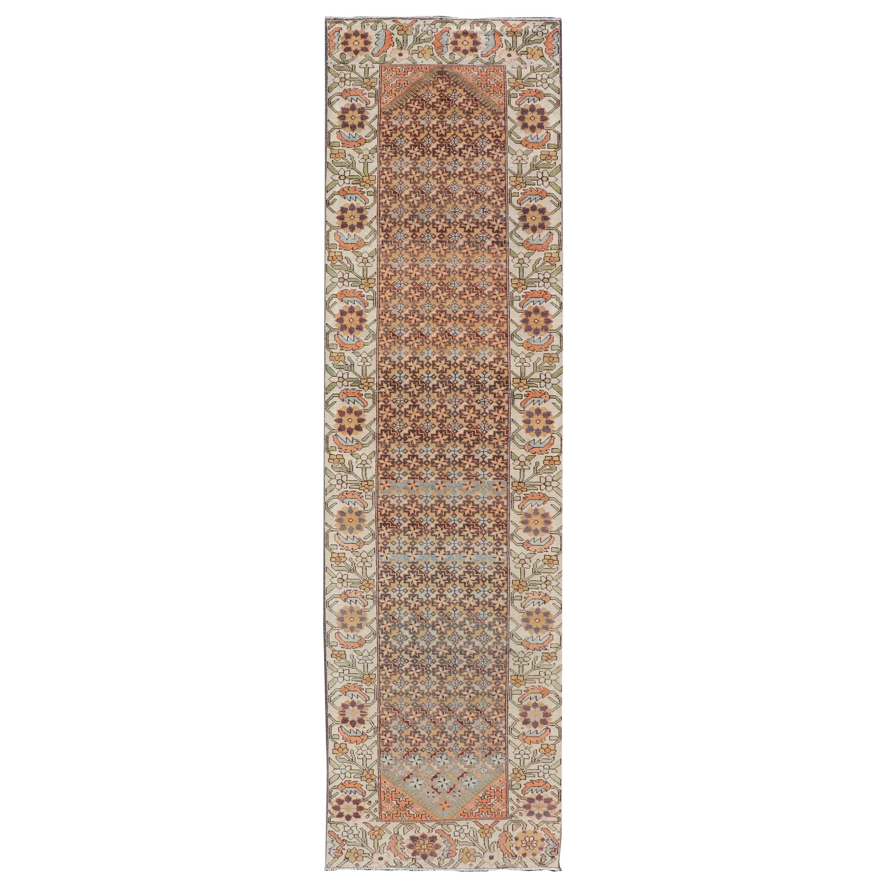 Coloratissimo runner antico persiano Bakhtiari con bordo floreale e tribale