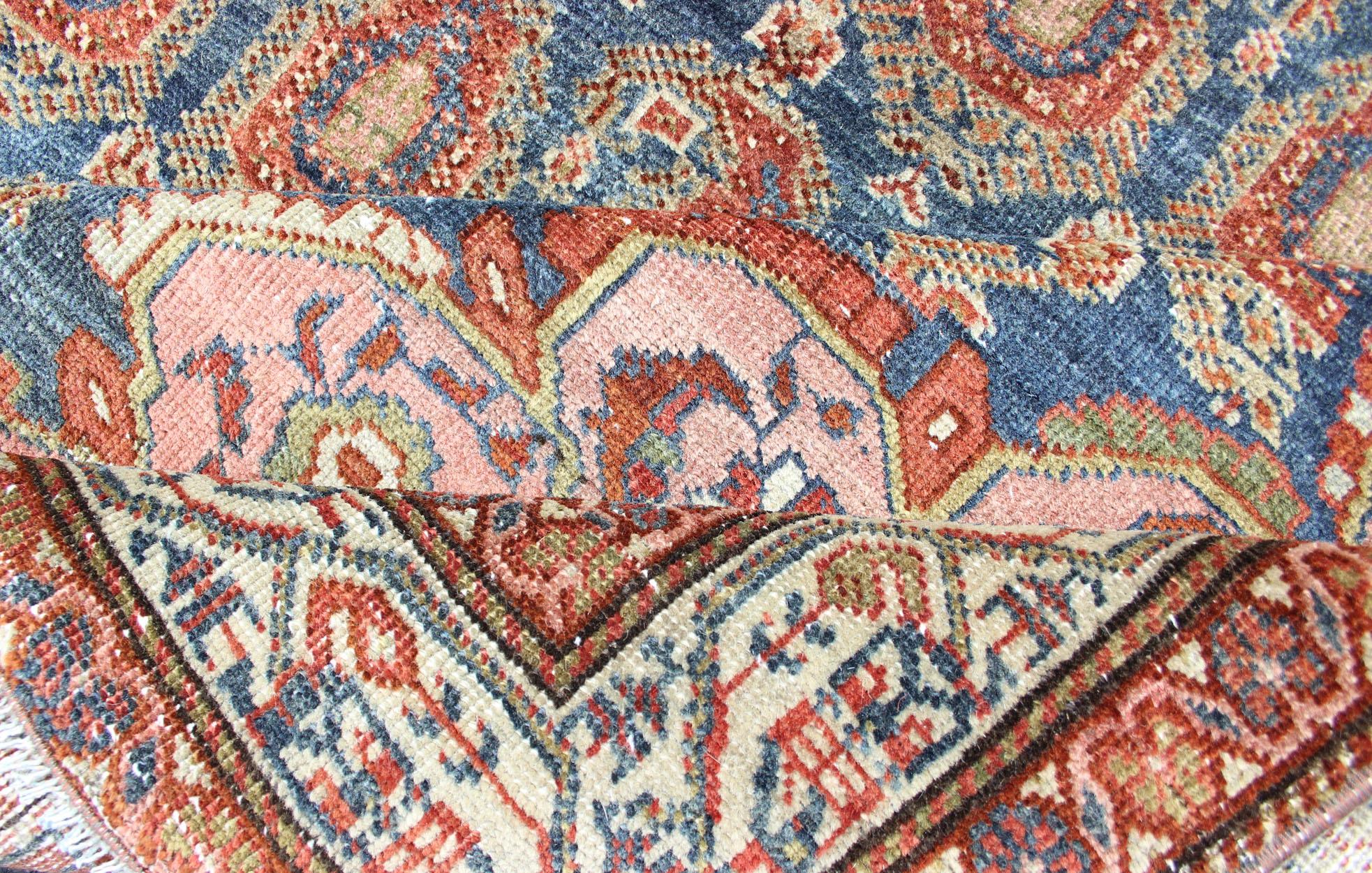 Antique Persian Hamadan rug with gorgeous Caribbean blue and colorful paisleys. rug R20-0718-273, country of origin / type: Iran / Hamadan, circa 1910.

This antique Persian Hamadan rug (circa early 20th century) features a unique blend of colors