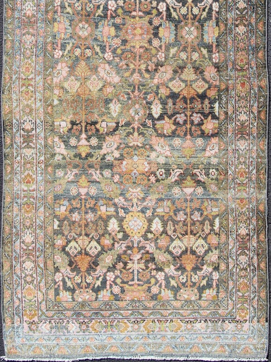 Antique Hamedan runner from Persian with colorful all-over floral design, rug zir-6, country of origin / type: Iran / Hamedan, circa 1910.

This antique Persian Hamedan gallery rug (circa early 20th century) features a unique blend of colors and