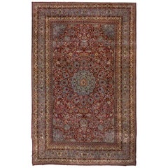 Tapis persan ancien coloré de Kerman, médaillon central, couleurs riches