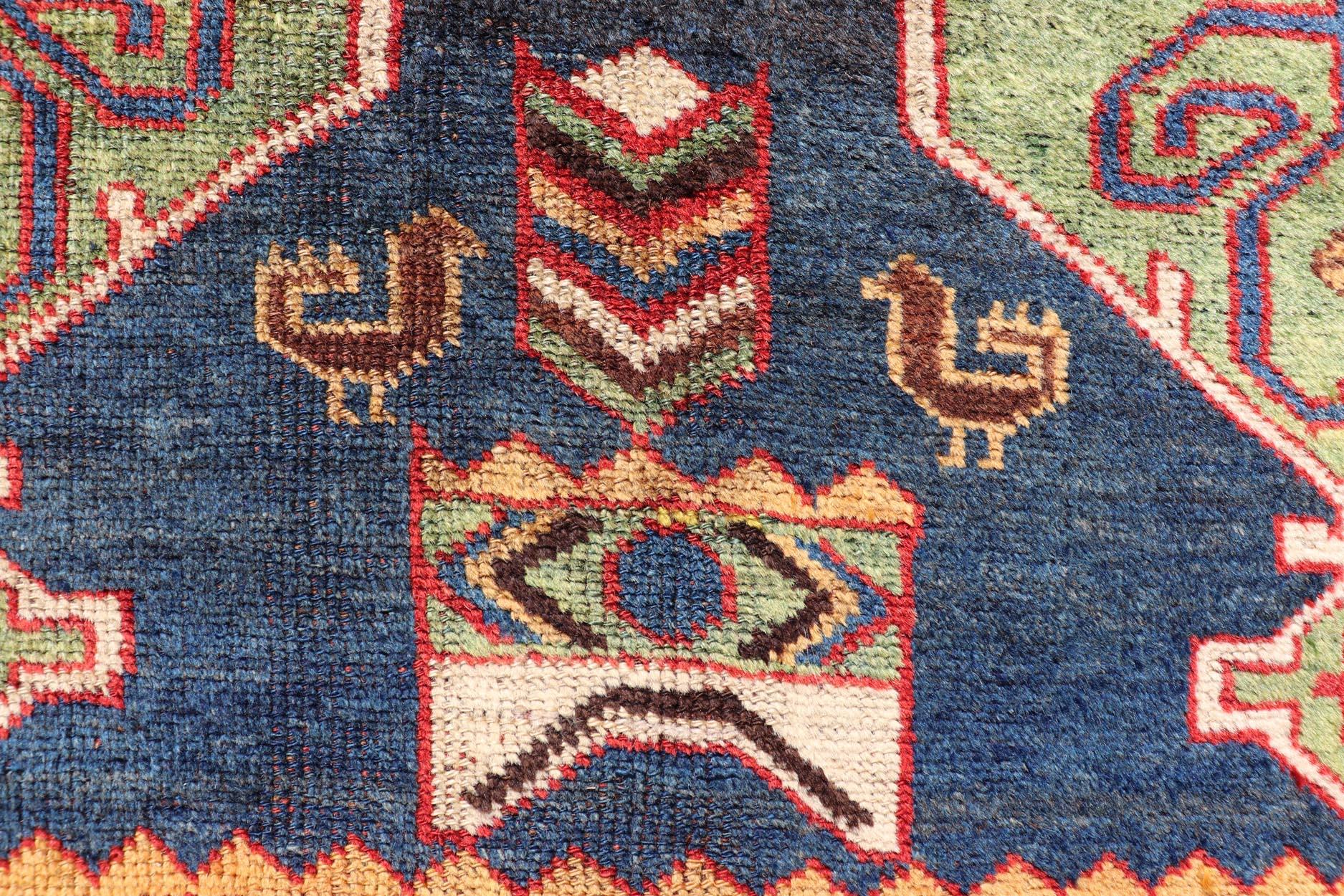 Noué à la main Tapis persan ancien Lori coloré à motifs tribaux géométriques sur toute sa surface en vente