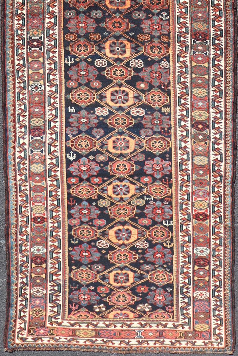 Colorful Antique Persian Lori Runner with Repeating Floral Palmette Design For Sale 2
