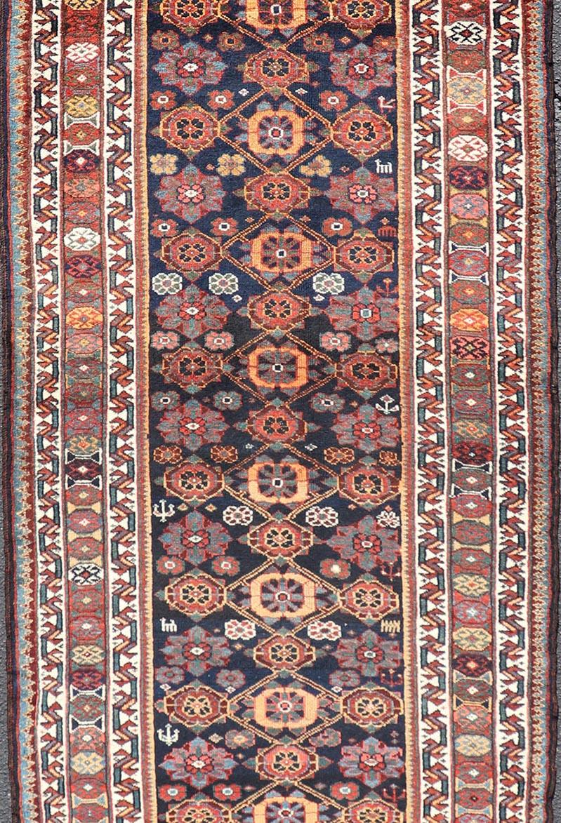 Colorful Antique Persian Lori Runner with Repeating Floral Palmette Design For Sale 1