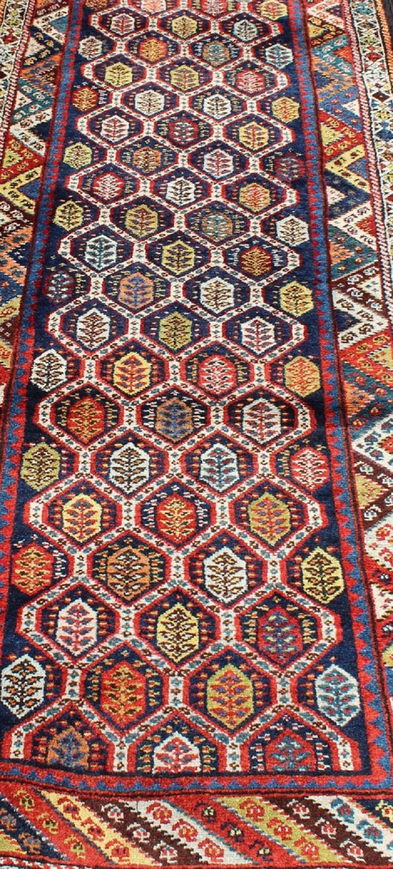 Colorful Antique Persian Lori Runner with Repeating Geometric Palmette Design For Sale 4