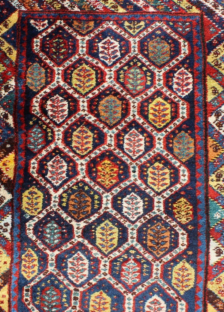 Colorful Antique Persian Lori Runner with Repeating Geometric Palmette Design For Sale 1